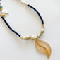 Collar de corazón de lapislázuli con ojo malvado